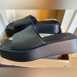 Brand new 90’s slides. Vegan, black. Lightweight platforms